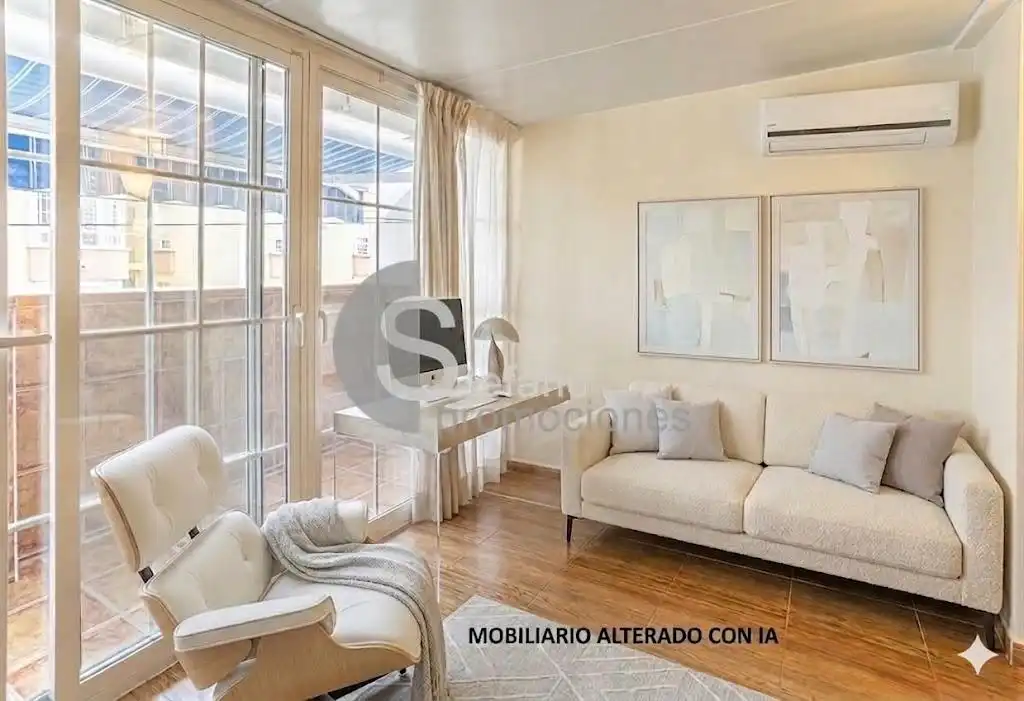 Sala d'estar de Casa adosada en venda en Málaga amb Aire condicionat, Terrassa i Traster
