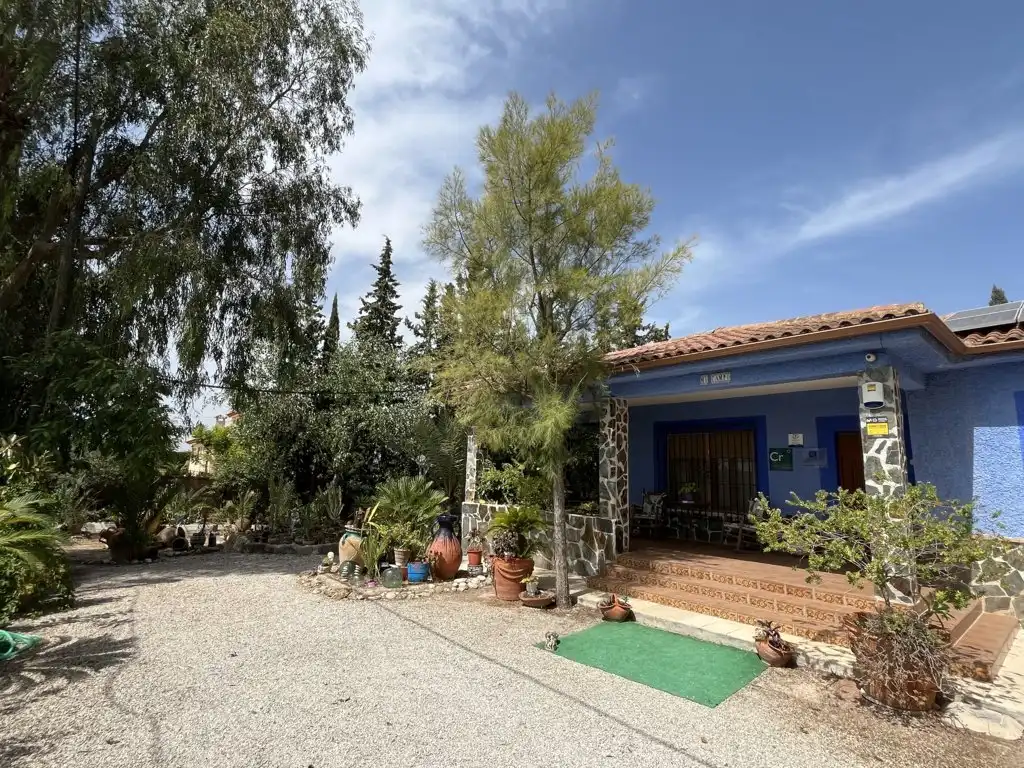 Casa rústica amb piscina en venda a El Fenazar - Campotéjar