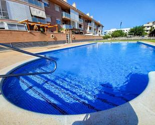 Swimming pool of Flat for sale in Cubelles  with Air Conditioner, Terrace and Balcony