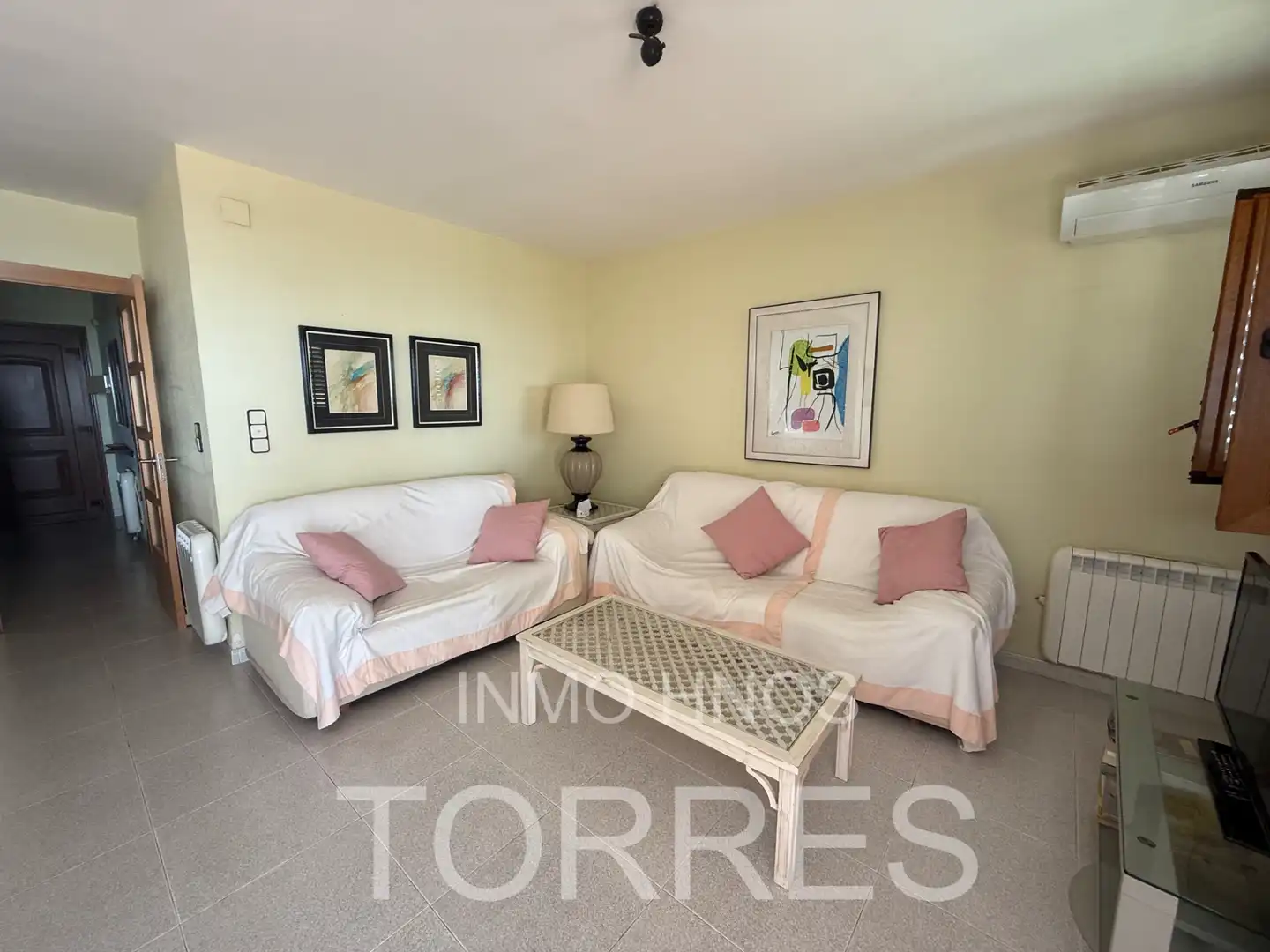 Sala de estar de Casa adosada en venta en Benicarló con Aire acondicionado, Jardín privado y Terraza
