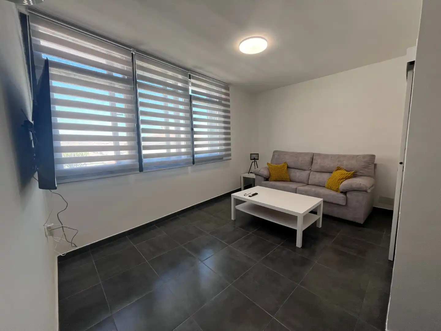 Sala d'estar de Dúplex de lloguer en Málaga amb Aire condicionat, Terrassa i Moblat