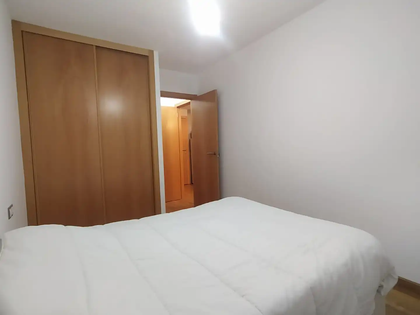 Habitación de Apartamento en venta en Cariño con Calefacción, Parquet y Amueblado