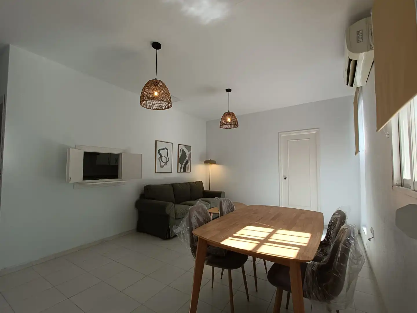 Sala d'estar de Àtic de lloguer en Sevilla amb Aire condicionat, Terrassa i Moblat