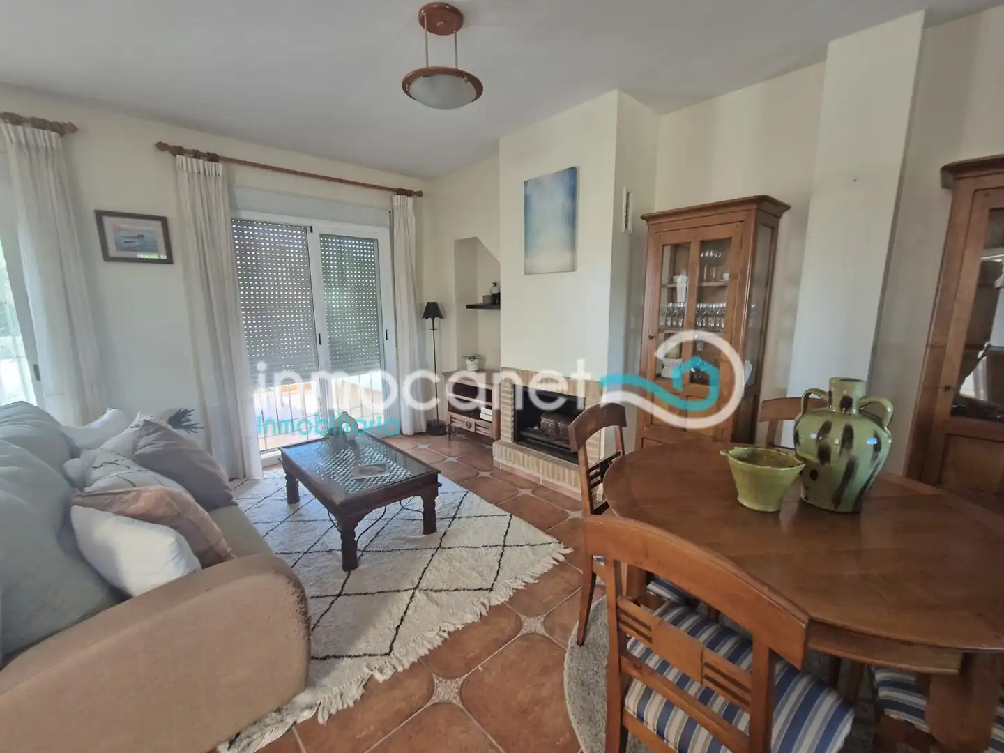 Sala d'estar de Casa adosada en venda en Oliva amb Jardí privat, Terrassa i Piscina