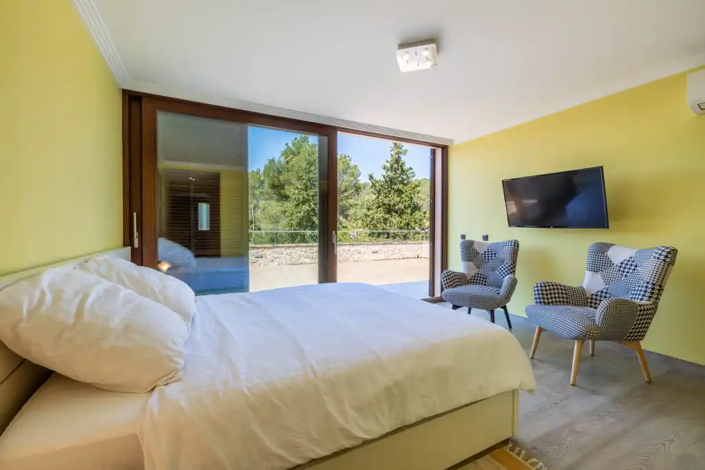 Habitación de Casa o chalet en venta en Pollença con Aire acondicionado, Jardín privado y Terraza