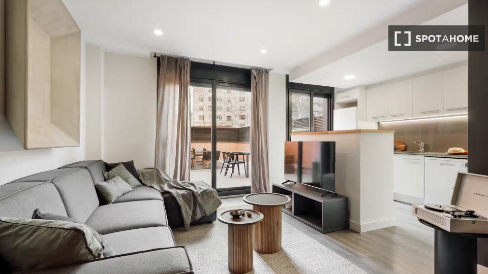 Sala de estar de Piso de alquiler en  Barcelona Capital con Aire acondicionado, Calefacción y Amueblado