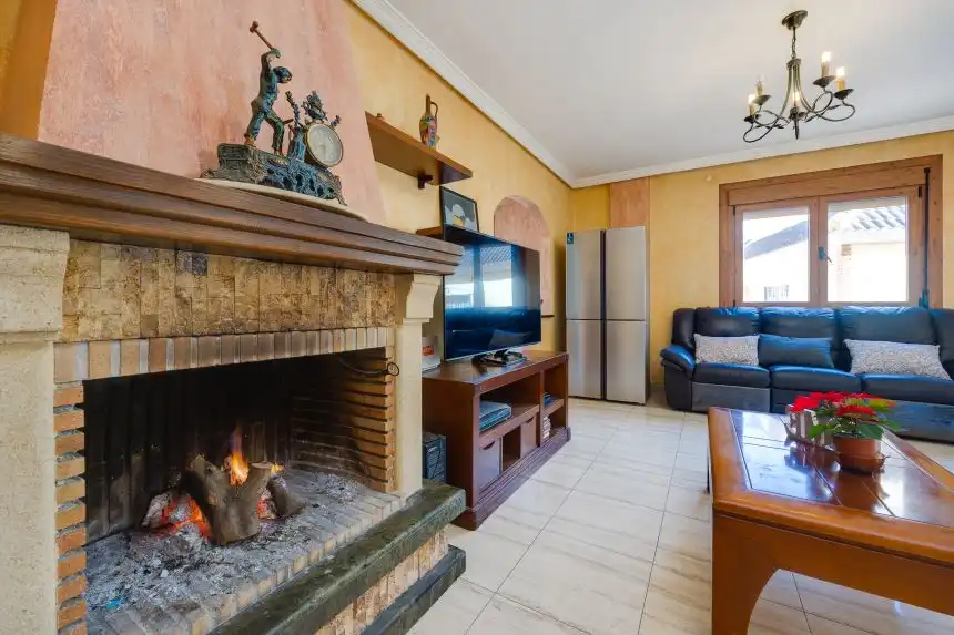 Sala de estar de Casa adosada en venta en Rojales con Aire acondicionado, Terraza y Amueblado