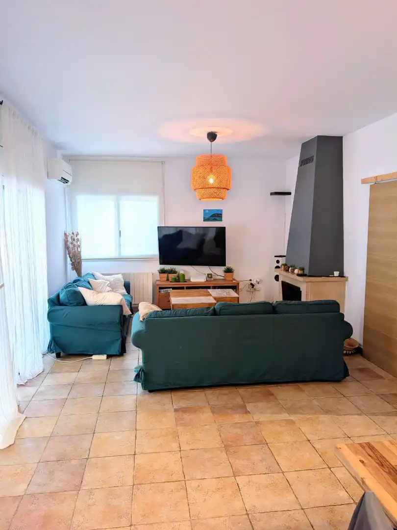 Sala d'estar de Casa o xalet en venda en Maçanet de la Selva amb Aire condicionat, Jardí privat i Terrassa