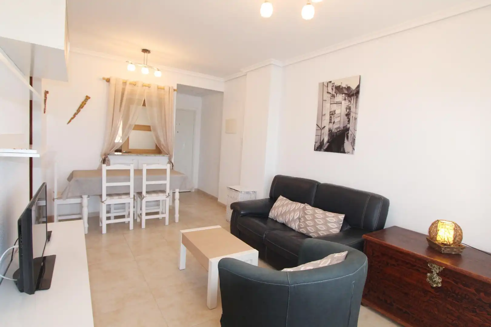 Sala d'estar de Apartament de lloguer en Cabanes amb Piscina comunitària
