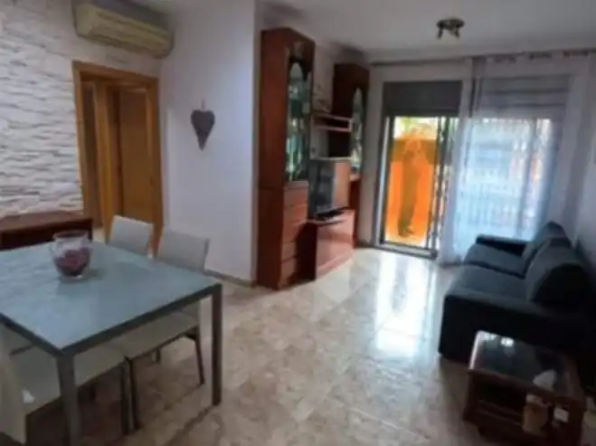 Sala d'estar de Pis en venda en Calafell amb Aire condicionat, Calefacció i Jardí privat