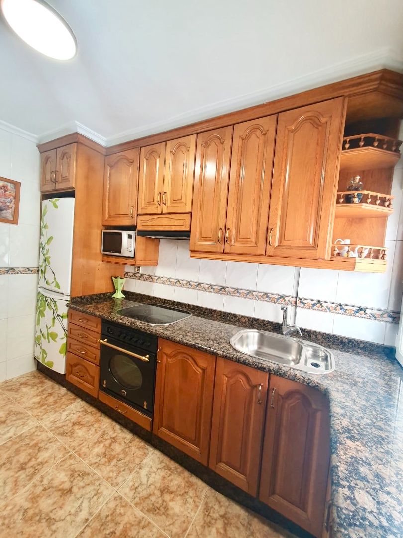 Kitchen of Flat for sale in Gijón   with Heating and Parquet flooring