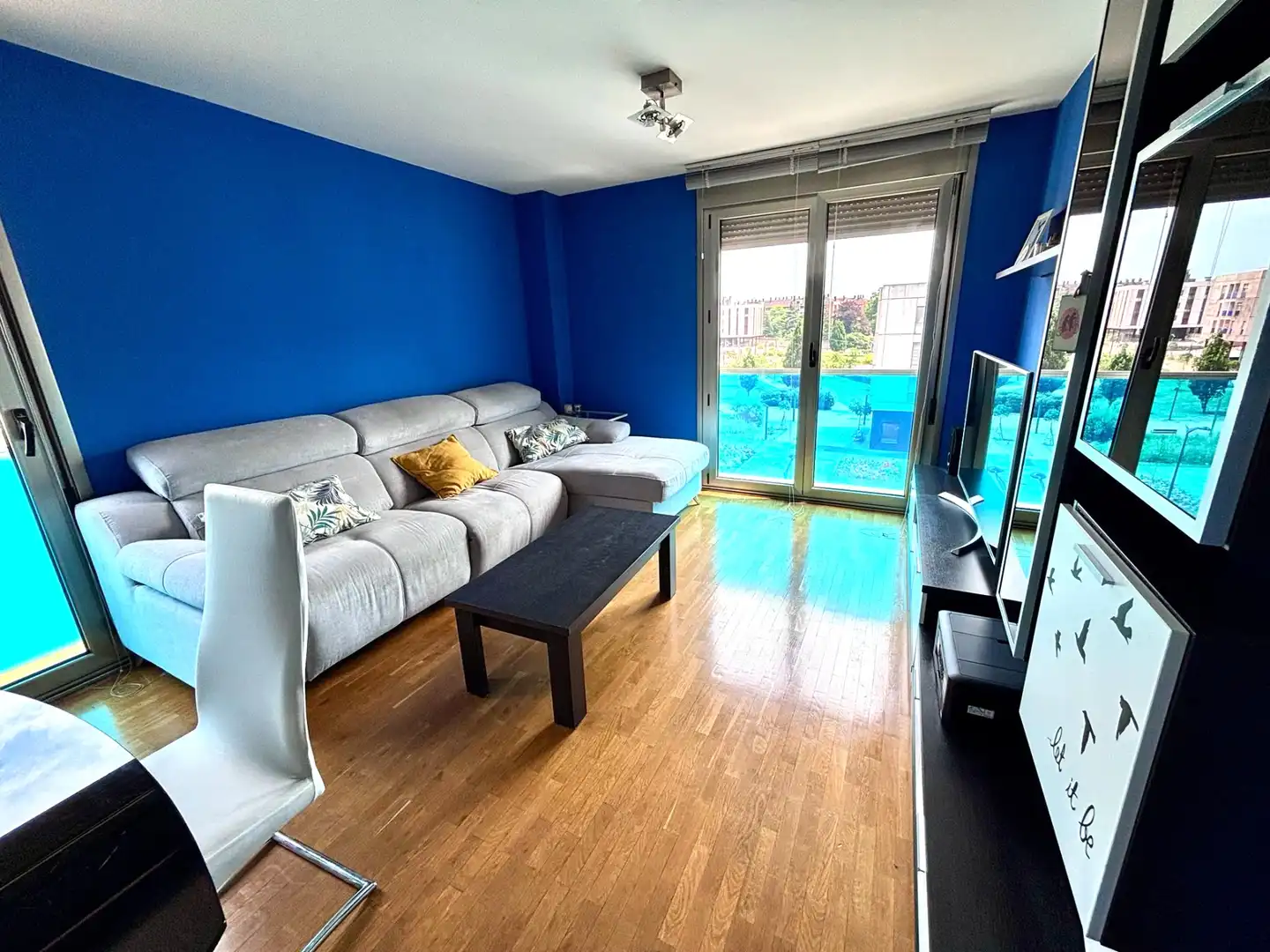 Living room of Flat for sale in Gijón   with Heating, Private garden and Parquet flooring
