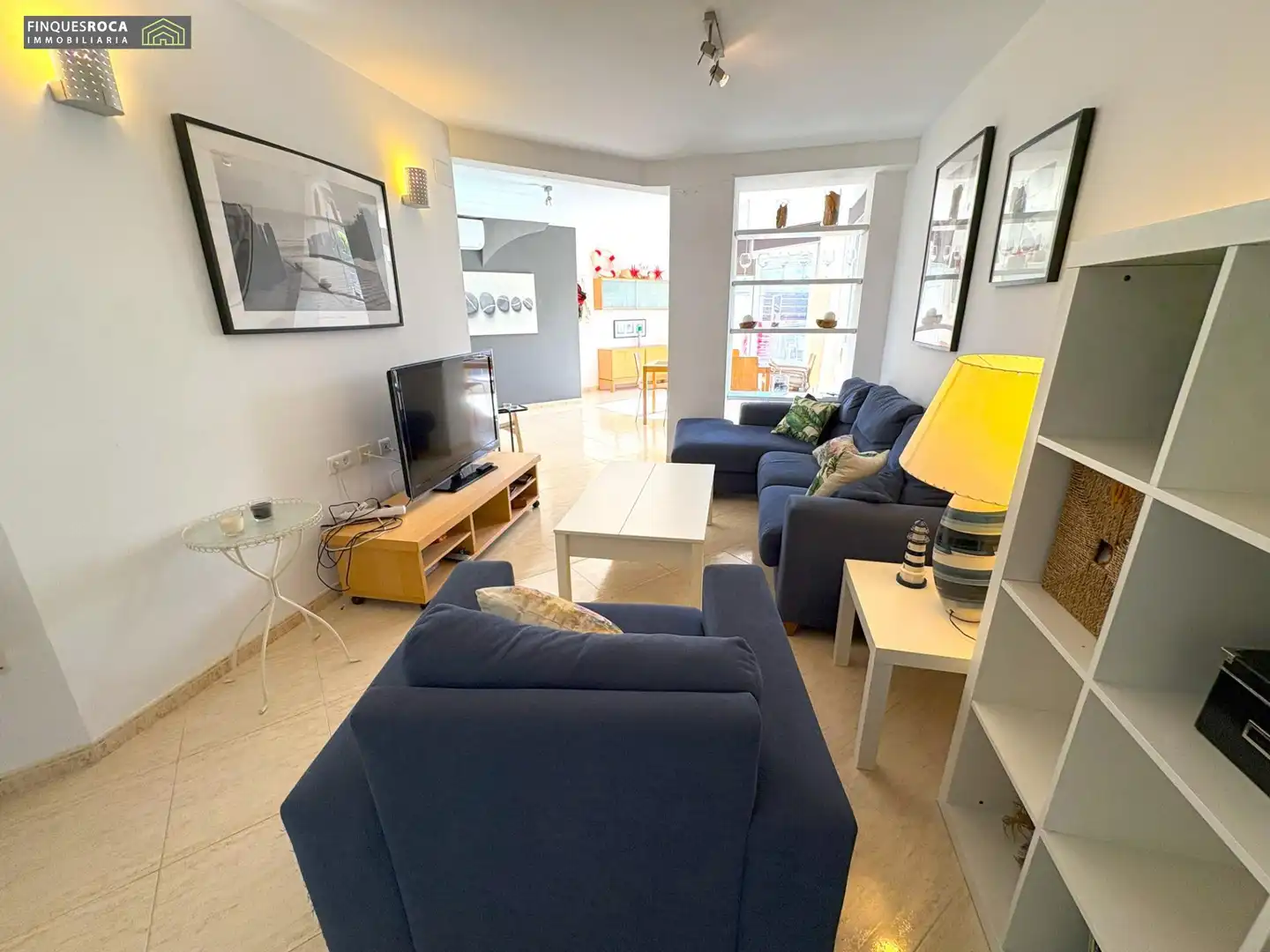 Sala d'estar de Casa adosada en venda en La Ràpita amb Aire condicionat, Jardí privat i Terrassa