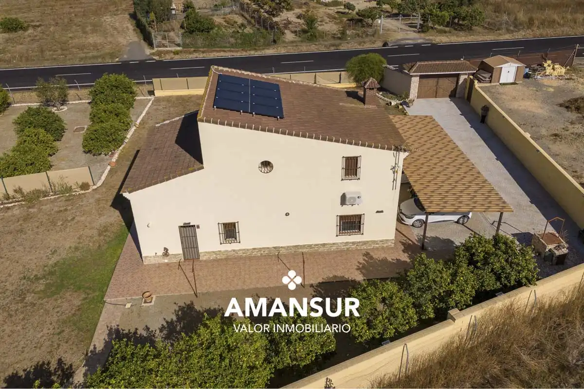 Vista exterior de Casa o xalet en venda en Villarrasa amb Aire condicionat, Calefacció i Jardí privat