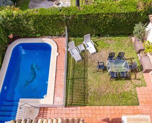 Swimming pool of Single-family semi-detached for sale in Valencina de la Concepción  with Air Conditioner, Heating and Private garden