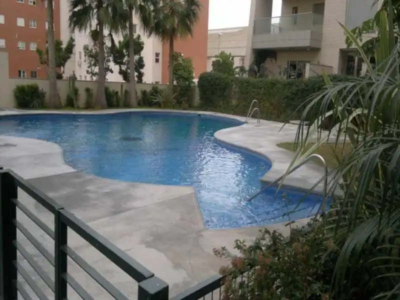 Piscina de Planta baja en venta en Almería con Aire acondicionado, Terraza y Trastero