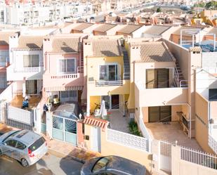 Exterior view of Single-family semi-detached for sale in Torrevieja  with Air Conditioner, Furnished and Balcony