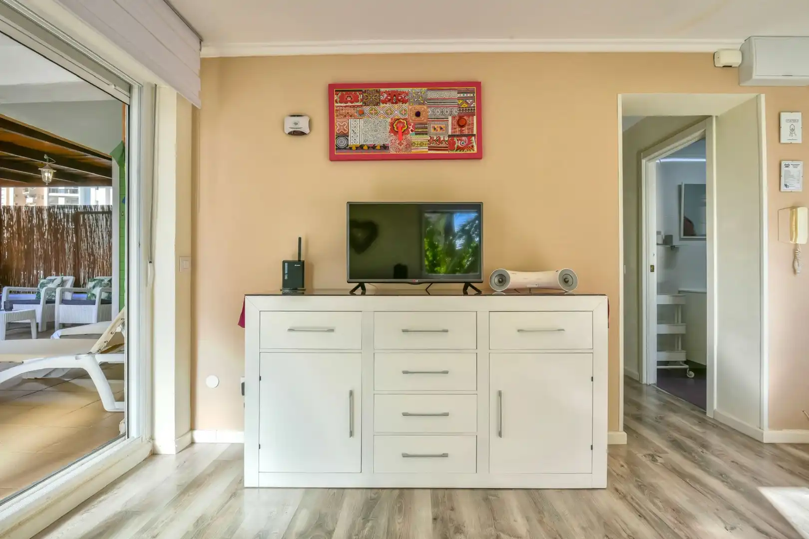 Sala d'estar de Apartament en venda en Calpe / Calp amb Aire condicionat, Terrassa i Moblat