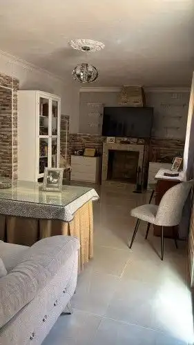 Sala d'estar de Casa adosada en venda en Gibraleón amb Aire condicionat i Calefacció