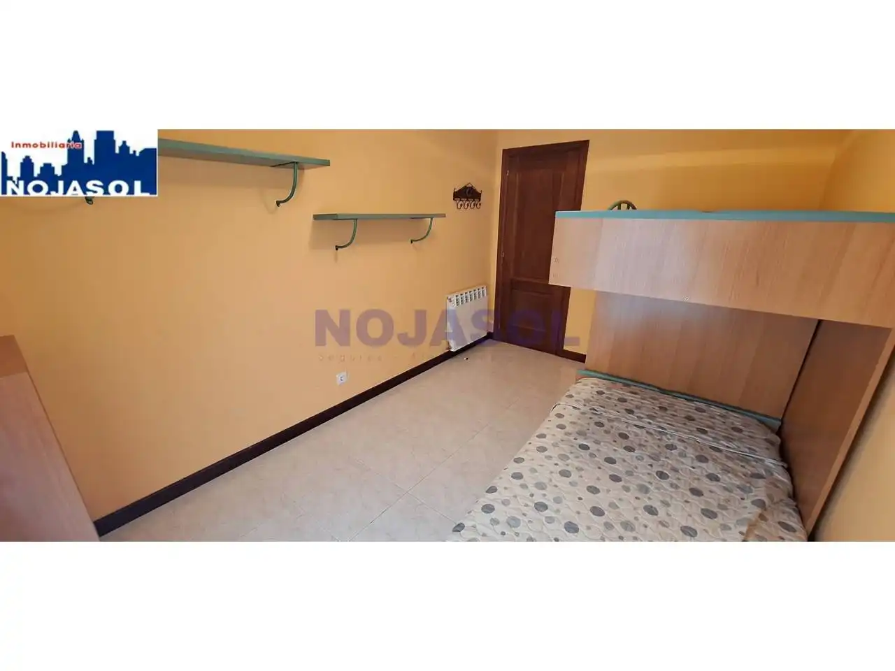 Dormitori de Apartament de lloguer en Noja amb Calefacció, Jardí privat i Terrassa