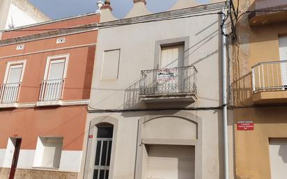 Vista exterior de Casa adosada en venda en Camarles amb Terrassa i Balcó