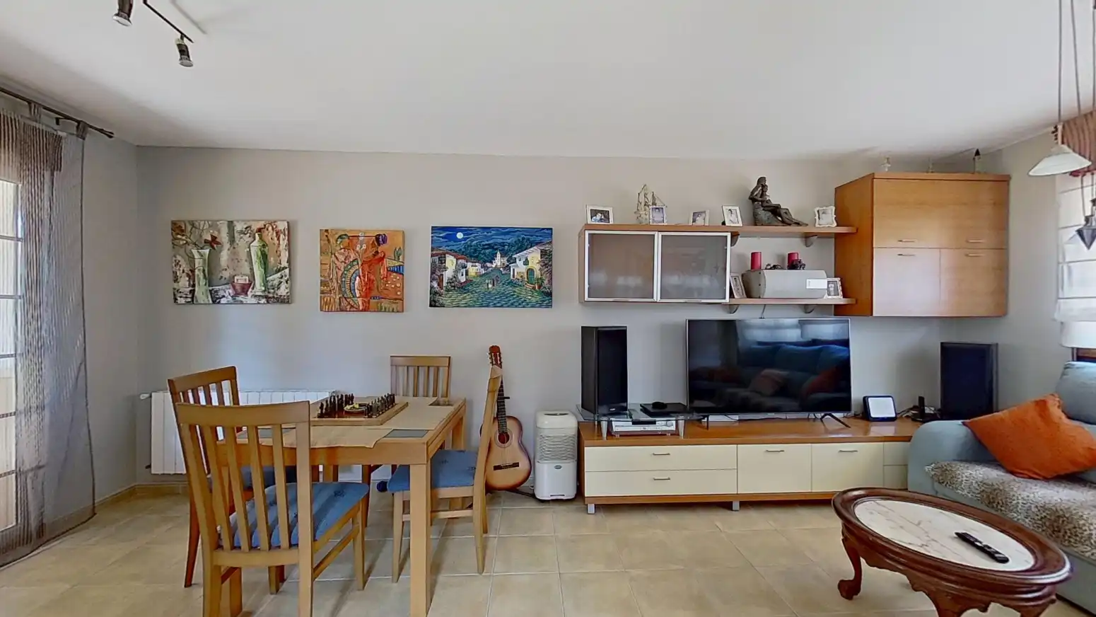 Sala d'estar de Casa adosada en venda en Suances amb Calefacció i Terrassa