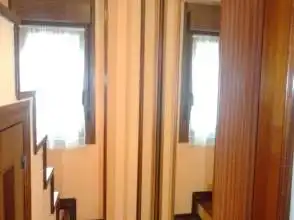 Schlafzimmer von Wohnung zur Miete in Gijón  mit Heizung, Parkett und Möbliert