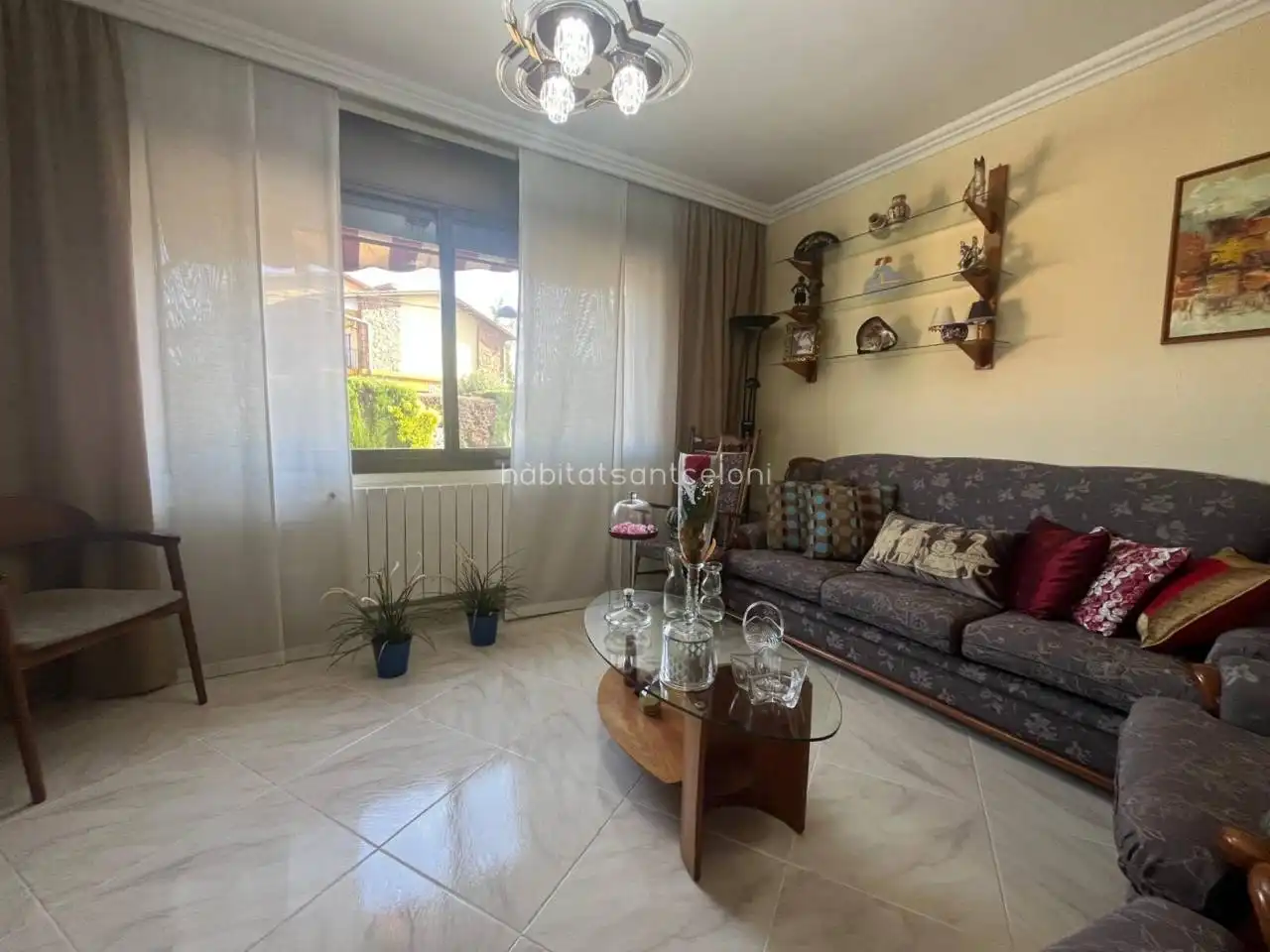 Sala d'estar de Casa adosada en venda en Sant Celoni amb Aire condicionat, Calefacció i Jardí privat