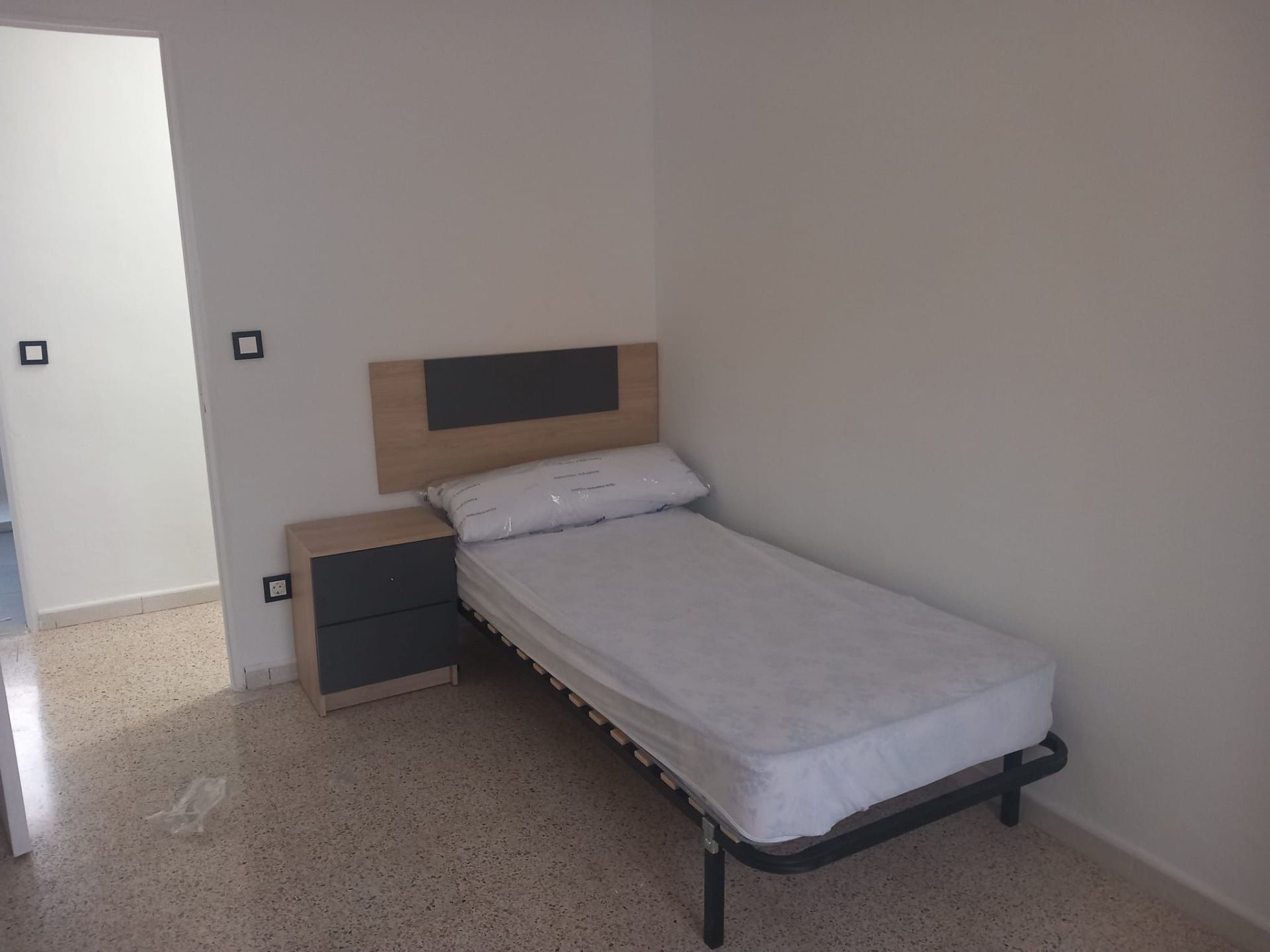 Dormitori de Pis de lloguer en Mérida amb Aire condicionat i Moblat