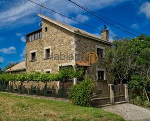 Vista exterior de Casa o xalet en venda en Sanxenxo amb Calefacció, Jardí privat i Terrassa