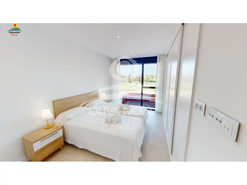 Schlafzimmer von Wohnungen zum Verkauf in Oliva mit Klimaanlage, Privatgarten und Terrasse
