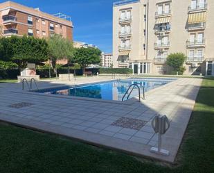 Swimming pool of Planta baja for sale in Calafell  with Air Conditioner, Heating and Private garden