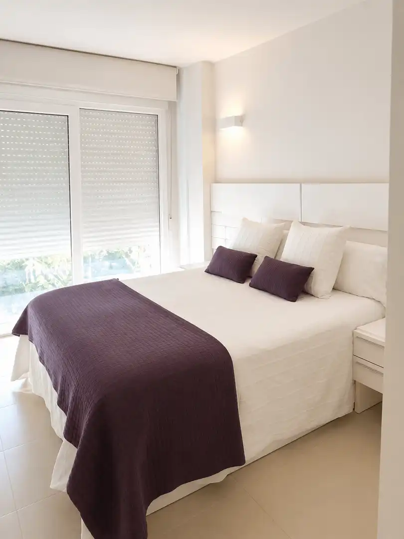 Dormitori de Apartament de lloguer en Castell d'Aro, Platja d'Aro i s'Agaró amb Aire condicionat i Piscina