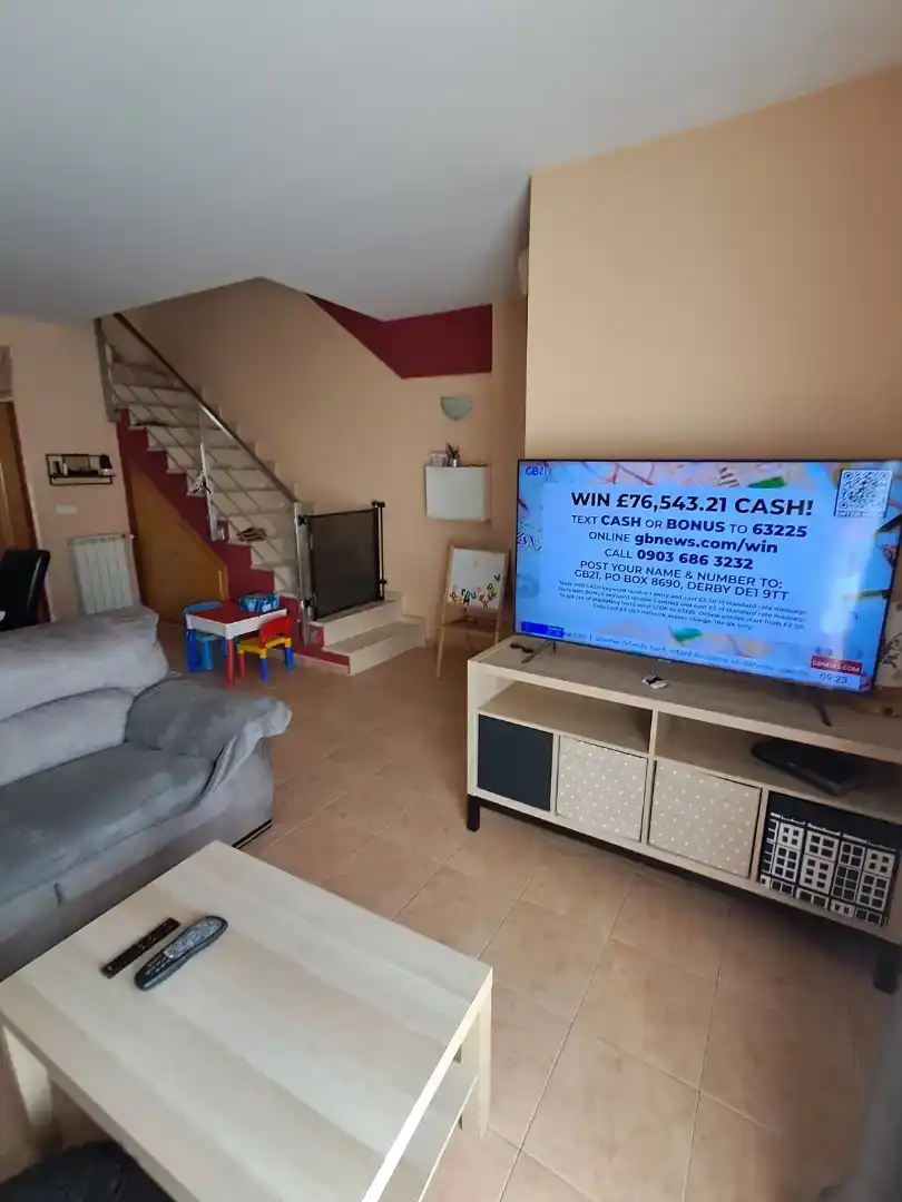 Sala d'estar de Casa adosada en venda en Ondara