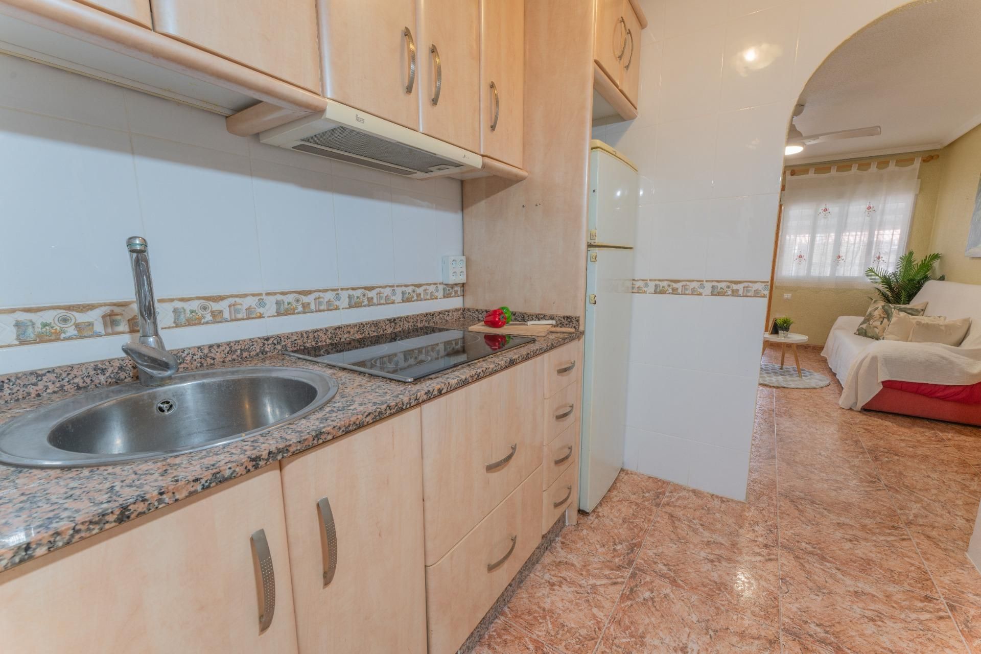 Cuina de Planta baixa en venda en Santa Pola amb Aire condicionat, Jardí privat i Terrassa