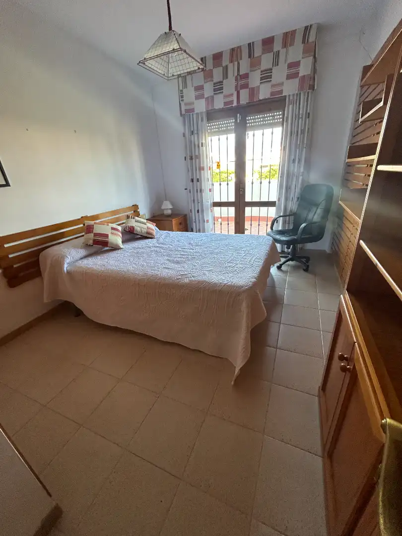 Dormitori de Casa adosada en venda en Vélez-Málaga amb Aire condicionat, Calefacció i Jardí privat