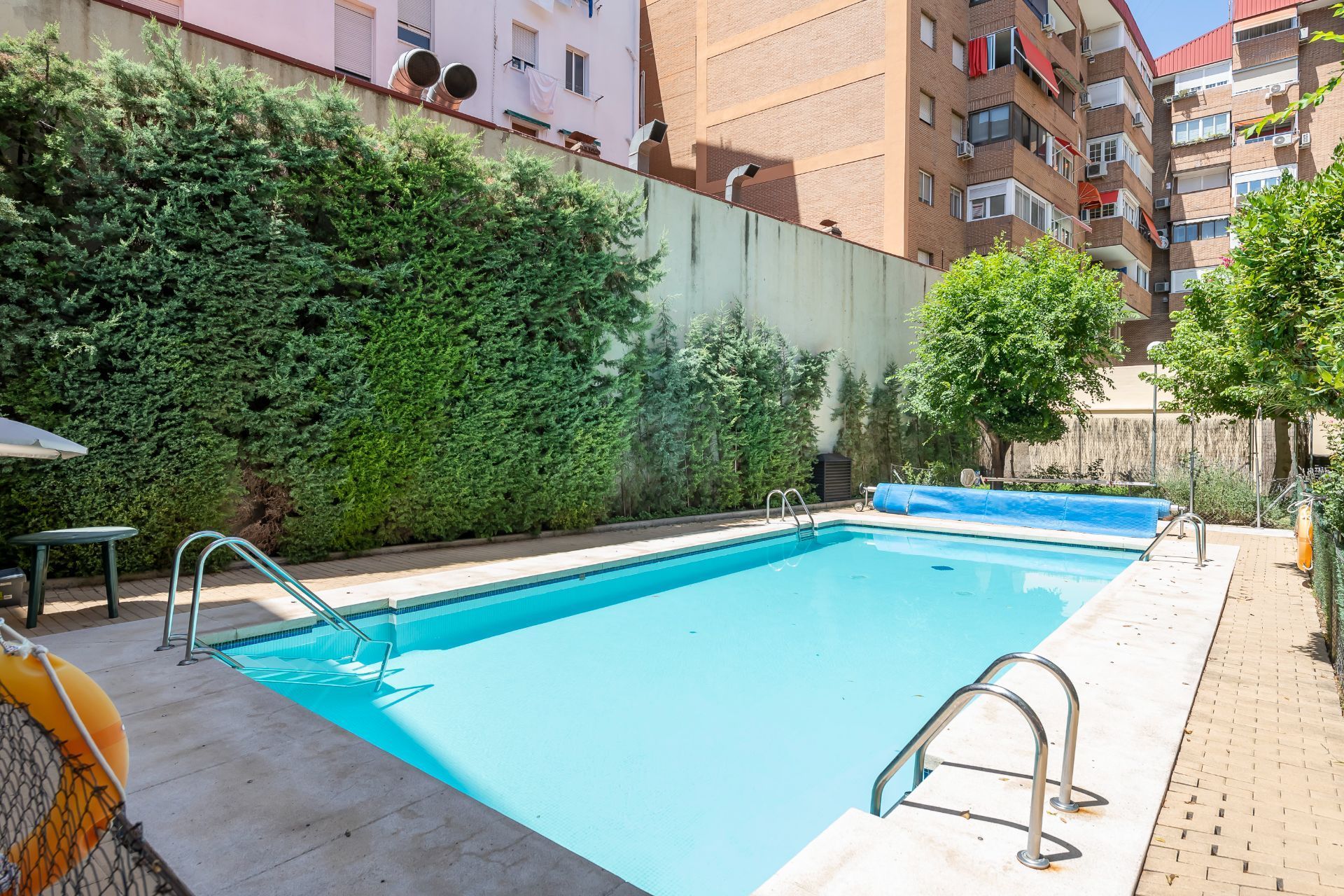 Swimming pool of Flat for sale in  Madrid Capital  with Air Conditioner, Heating and Storage room