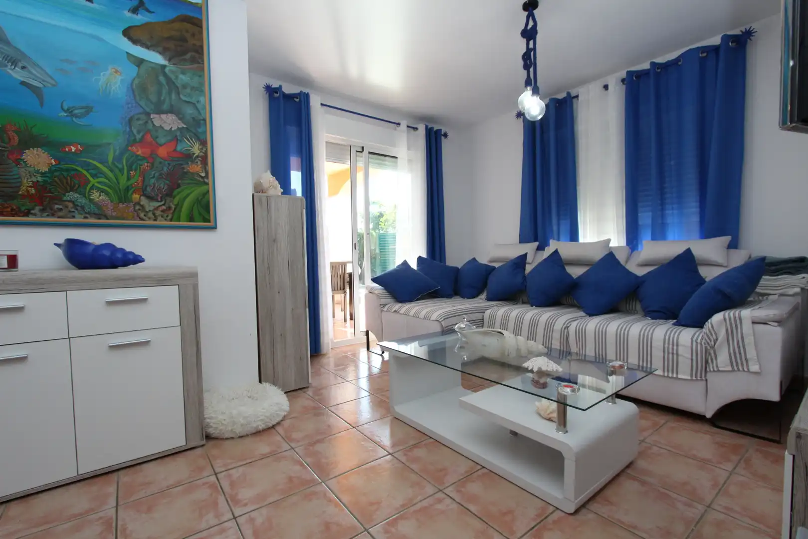 Sala de estar de Casa adosada en venta en Mont-roig del Camp con Aire acondicionado, Jardín privado y Amueblado