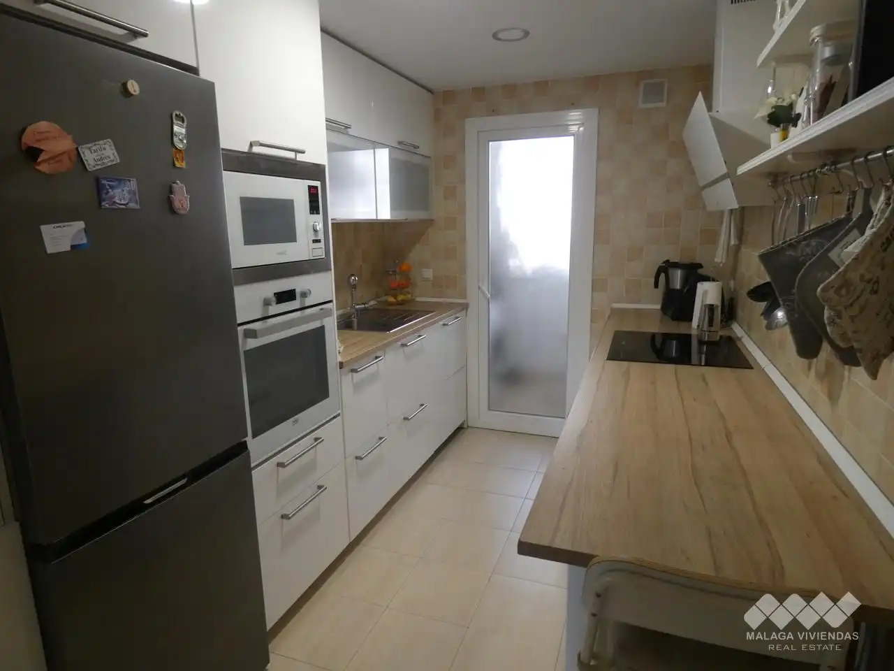 Küche von Einfamilien-Reihenhaus zum Verkauf in Alhaurín de la Torre mit Klimaanlage, Terrasse und Abstellraum