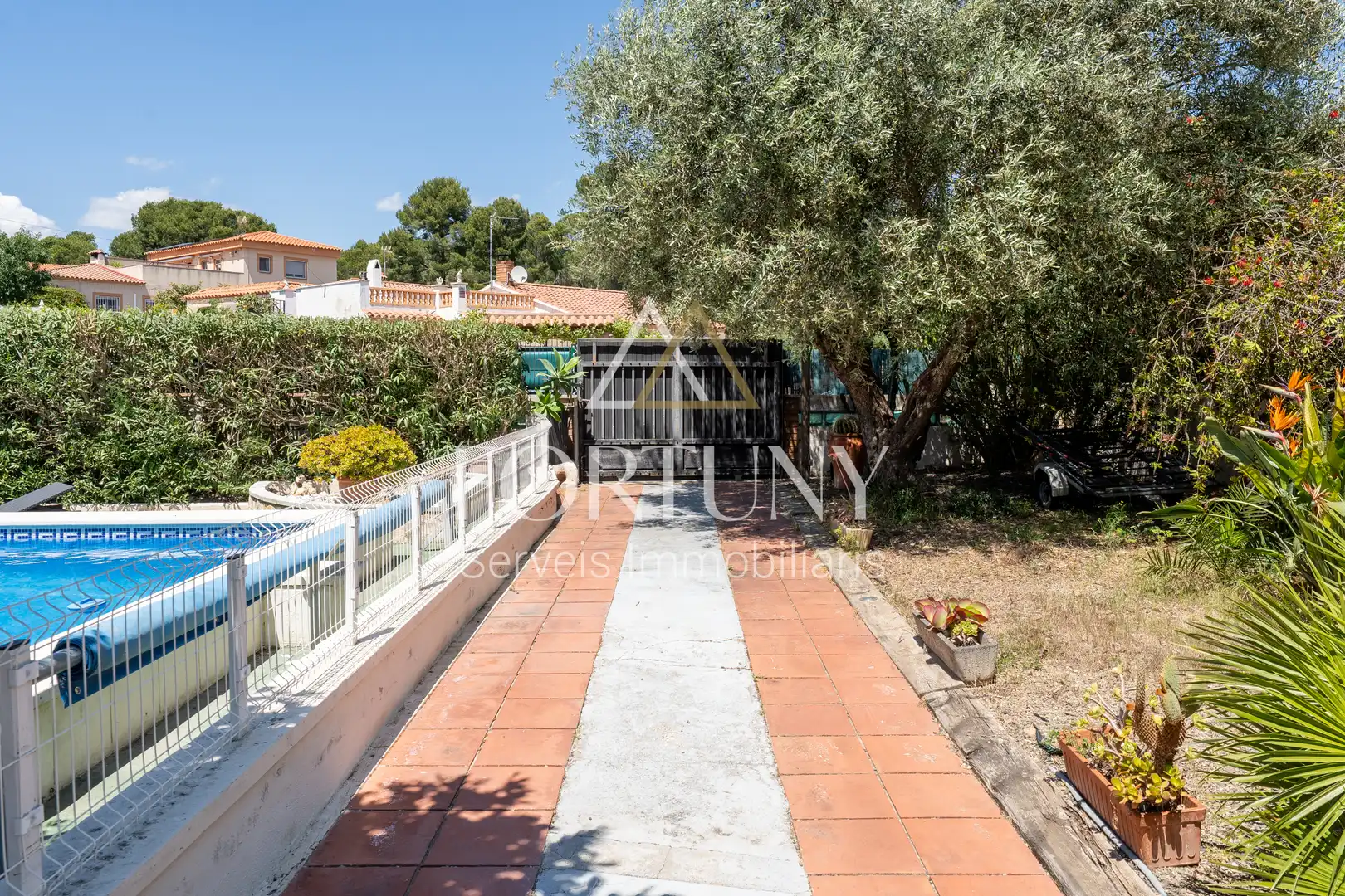 Jardí de Casa o xalet en venda en Mont-roig del Camp amb Aire condicionat, Traster i Piscina