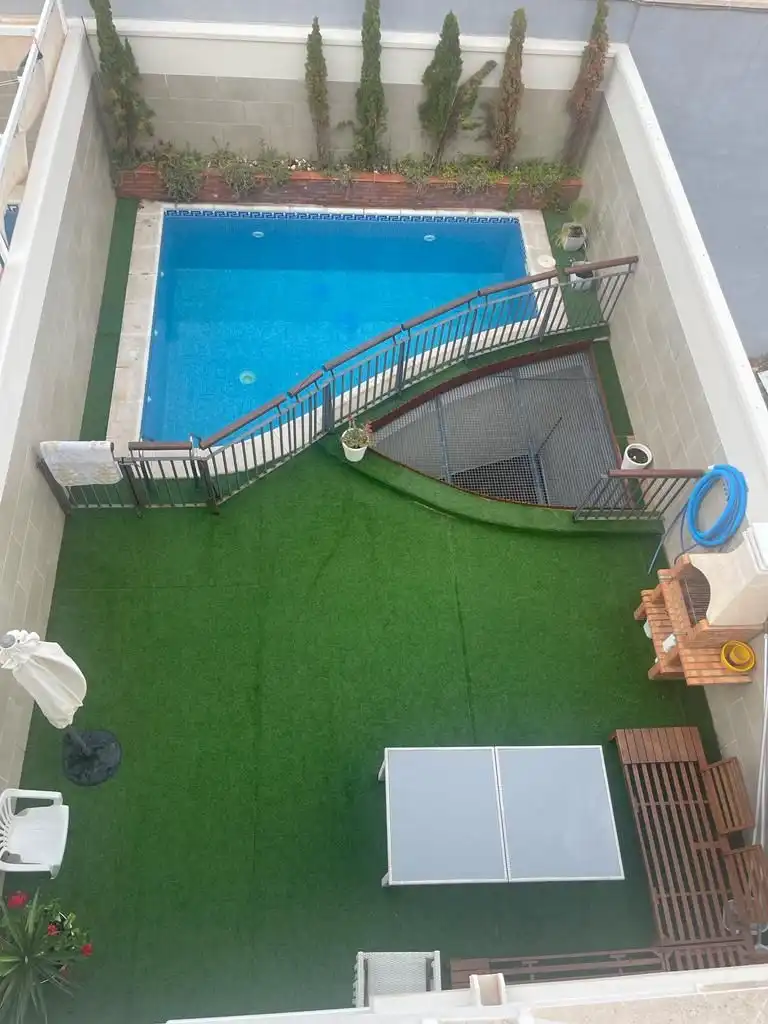 Piscina de Casa adosada en venta en Melilla con Aire acondicionado, Jardín privado y Terraza