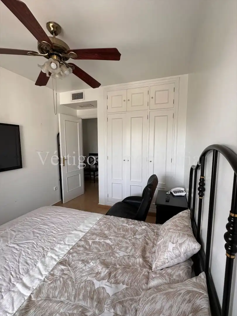 Schlafzimmer von Wohnung zum Verkauf in Dos Hermanas mit Klimaanlage, Heizung und Privatgarten