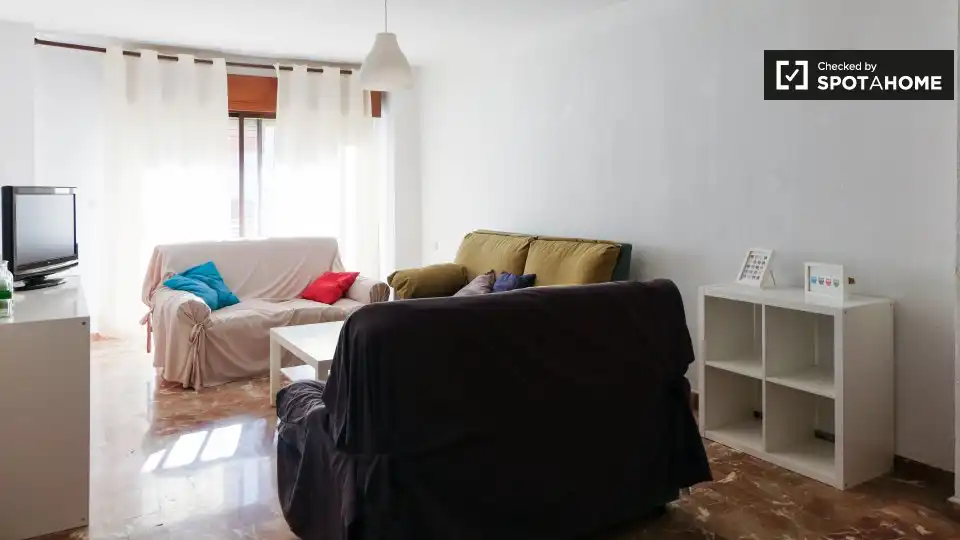 Sala d'estar de Apartament per a compartir en Granada amb Aire condicionat, Terrassa i Moblat