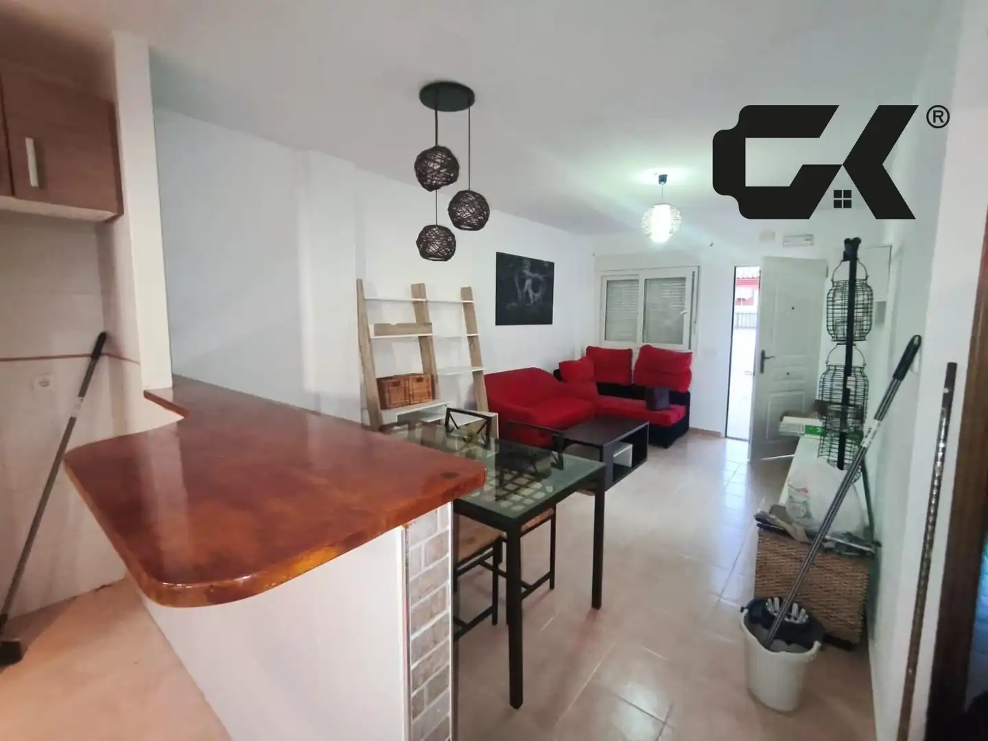 Sala d'estar de Casa adosada en venda en Mazarrón amb Aire condicionat, Jardí privat i Piscina comunitària