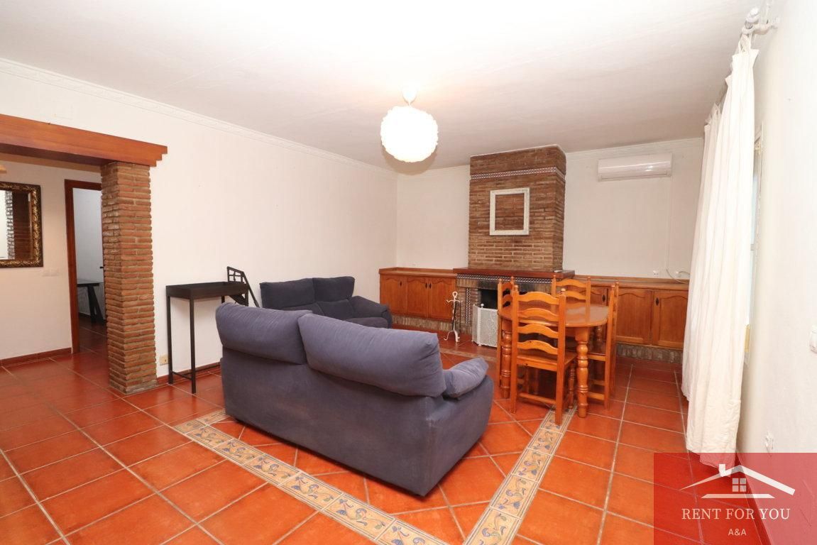 Sala d'estar de Casa o xalet de lloguer en Alhaurín de la Torre amb Aire condicionat, Jardí privat i Moblat