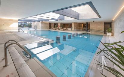 Swimming pool of Flat for sale in  Madrid Capital  with Air Conditioner, Heating and Storage room