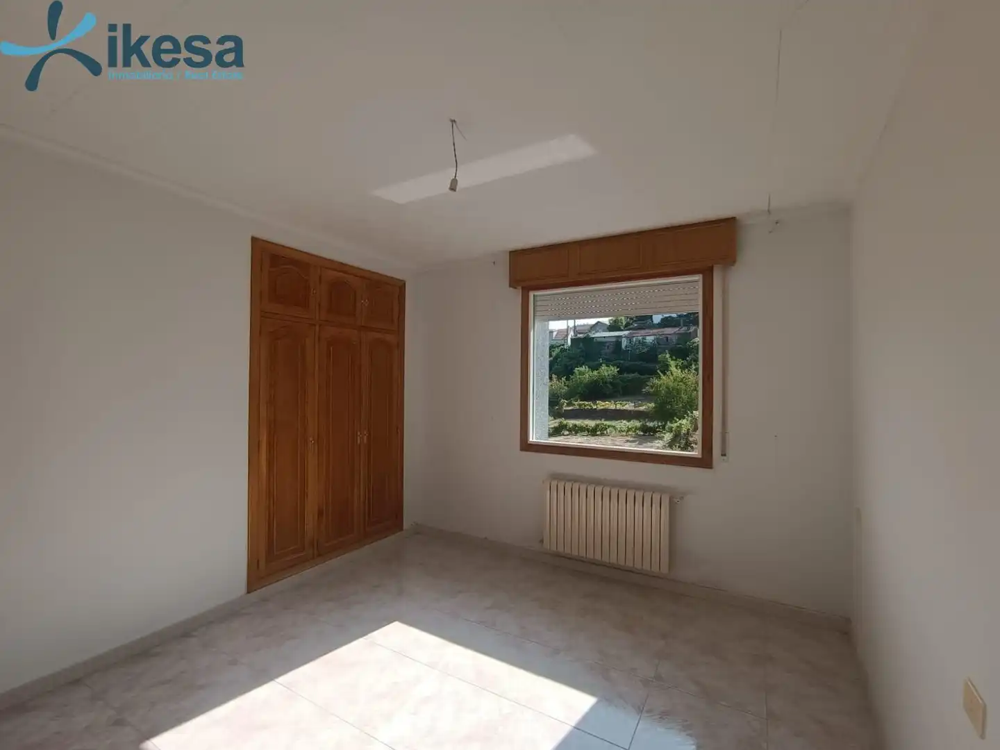 Dormitori de Casa o xalet en venda en Entrimo amb Jardí privat