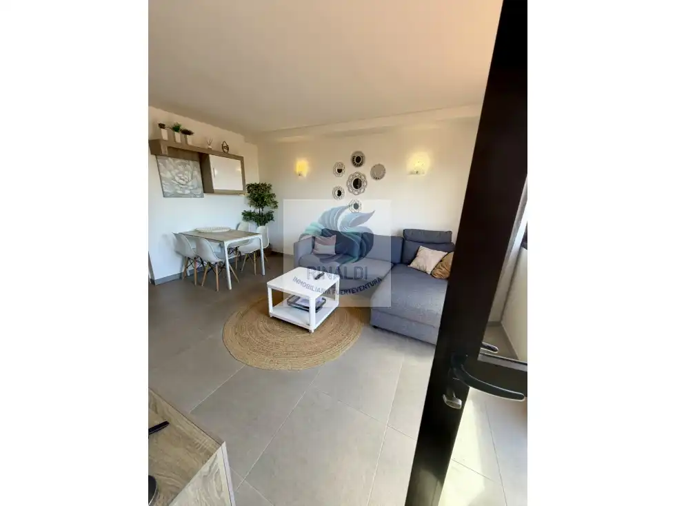 Sala de estar de Apartamento en venta en La Oliva con Terraza, Piscina y Amueblado