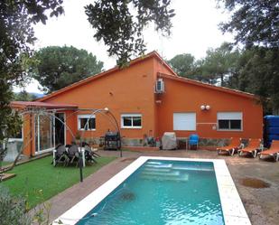 Swimming pool of House or chalet for sale in El Brull  with Air Conditioner, Heating and Private garden