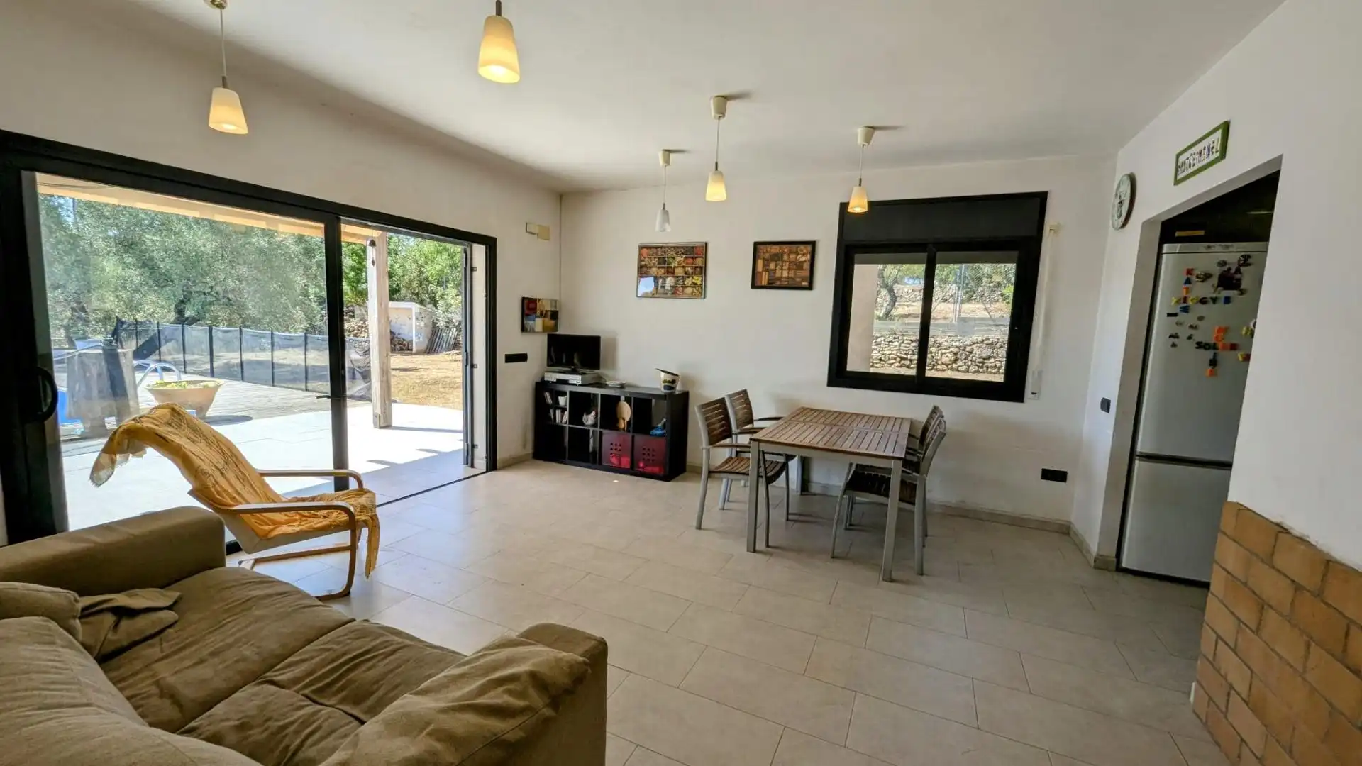 Sala d'estar de Finca rústica en venda en El Perelló amb Jardí privat, Terrassa i Traster